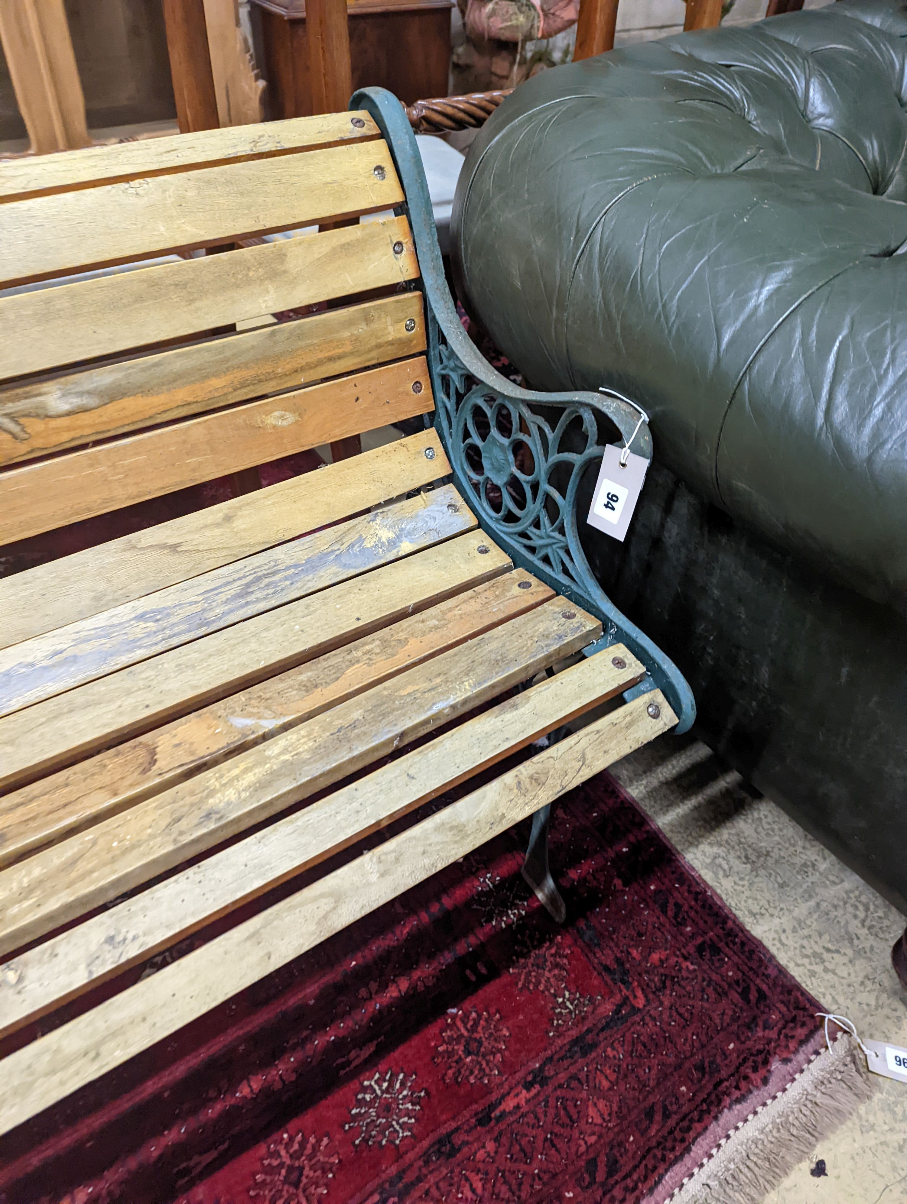 A Victorian style painted aluminium slatted garden bench, length 127cm, depth 55cm, height 67cm